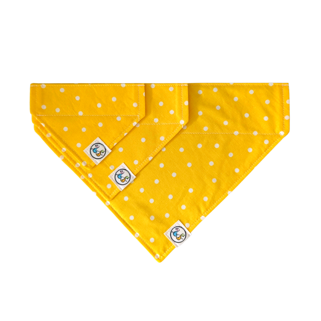 Image of three bandanas in different sizes (small, medium, and large) showcasing the Yellow Polka Dot design for size comparison.