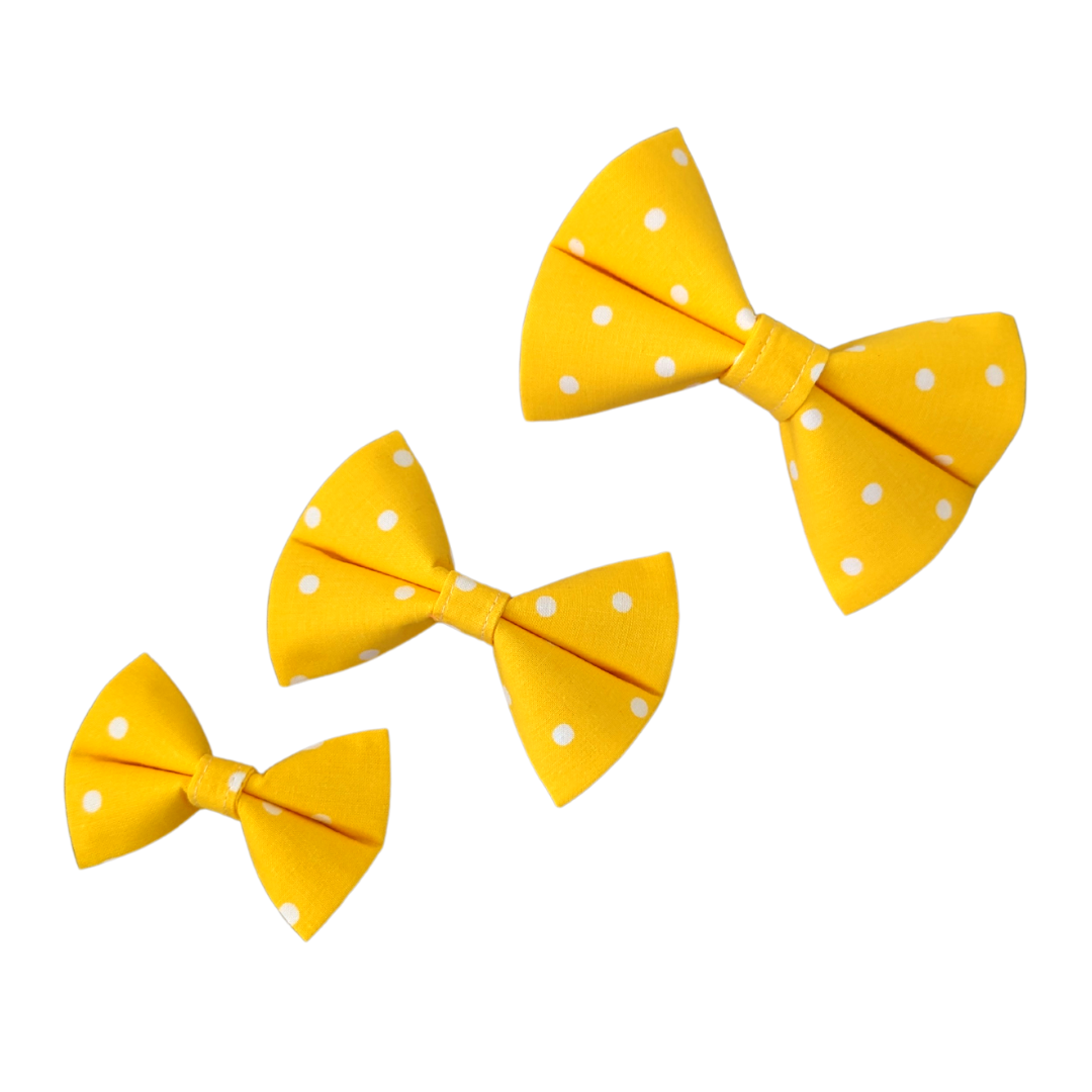 Image showcasing our Yellow Polka Dot Bow Ties in three sizes: Small, Medium, and Large, providing size comparison for reference.